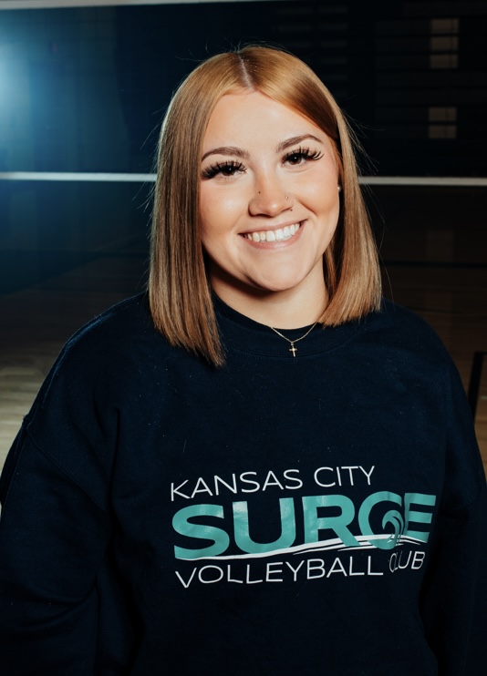 Coach Maddie Holcomb